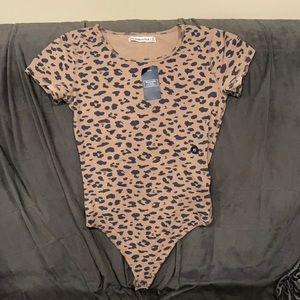 Abercrombie and Fitch leopard bodysuit. Brand new, never worn with tags. Size xs